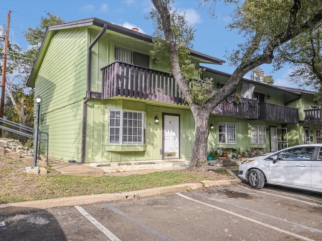 multi unit property featuring a balcony