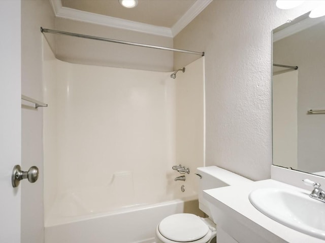 full bathroom featuring vanity, toilet, crown molding, and bathtub / shower combination