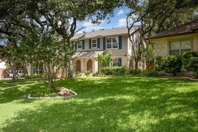 view of front of house with a front lawn