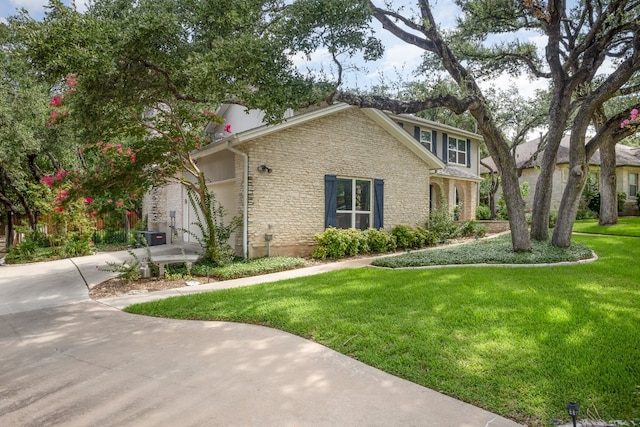 view of front of property with a front lawn