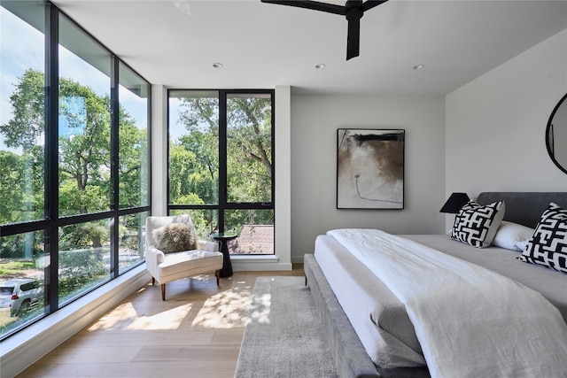 3003 Oakhaven Dr, Austin, TX 78704 - bedroom featuring wood finished floors and multiple windows