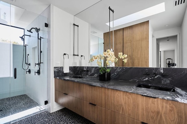 3003 Oakhaven Dr, Austin, TX 78704 - full bath with a stall shower and double vanity