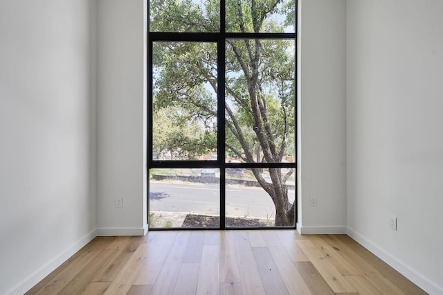 3003 Oakhaven Dr, Austin, TX 78704 - empty room with wood finished floors and baseboards