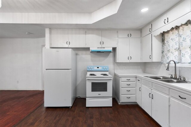 kitchen featuring dark hardwood / wood-style flooring, sink, white cabinets, and white appliances