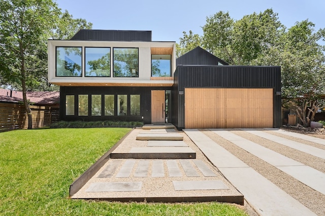 modern home with a front lawn