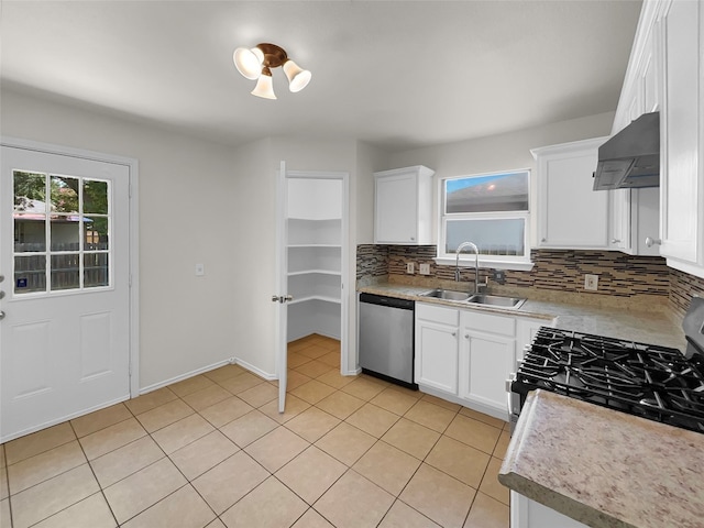 kitchen featuring white cabinets, sink, premium range hood, backsplash, and dishwasher