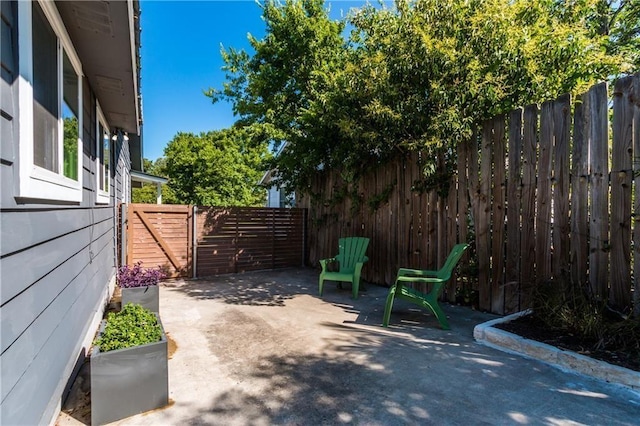 view of patio with fence