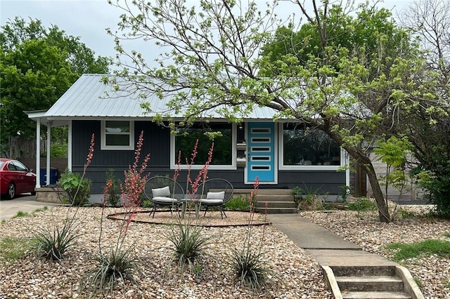 view of front of property featuring metal roof