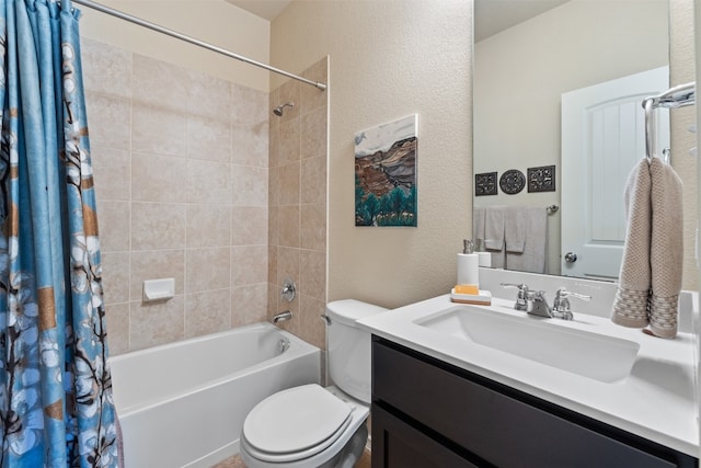 full bathroom featuring vanity, shower / tub combo with curtain, and toilet