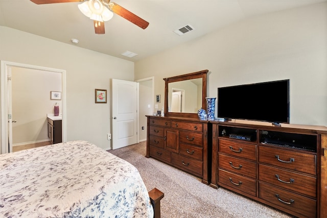 bedroom featuring light carpet and ceiling fan