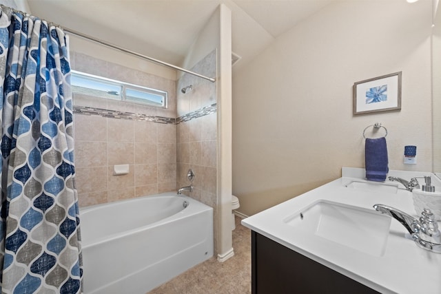 full bathroom with vanity, tile patterned floors, shower / bath combo with shower curtain, toilet, and lofted ceiling