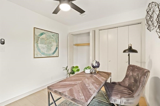 office space with light hardwood / wood-style flooring and ceiling fan