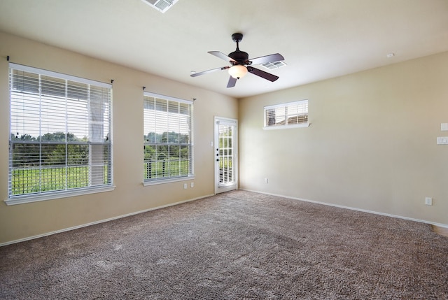 unfurnished room featuring carpet floors and ceiling fan