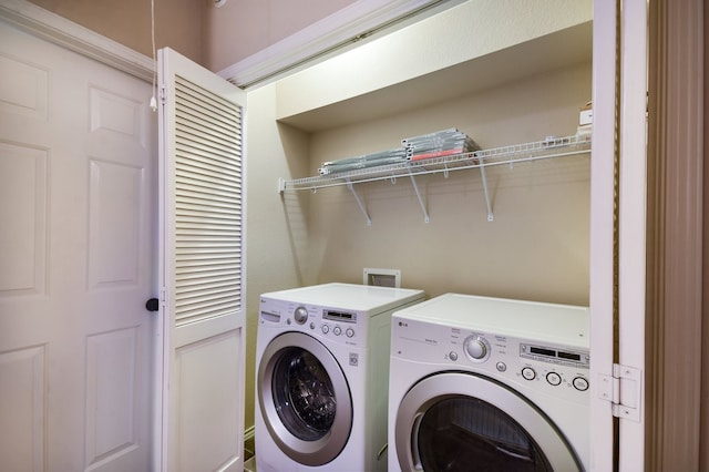 laundry area featuring independent washer and dryer