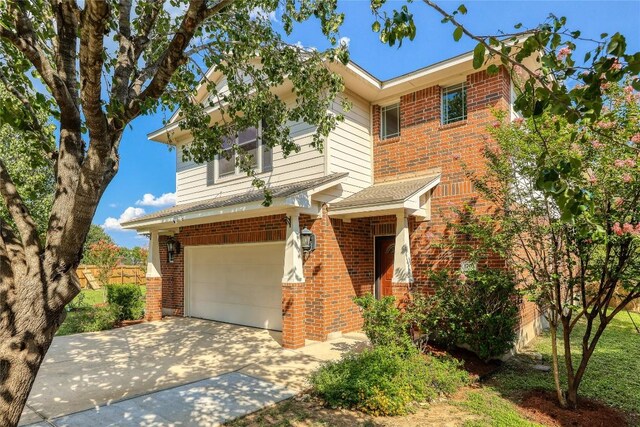 view of front of property with a garage