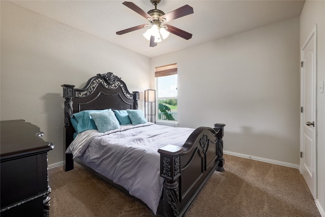 carpeted bedroom with ceiling fan