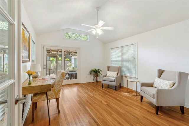 office with ceiling fan, lofted ceiling, and light hardwood / wood-style floors