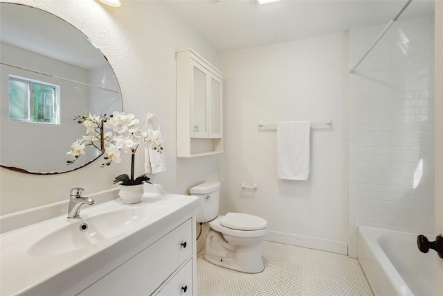 full bathroom featuring shower / washtub combination, tile patterned floors, toilet, and vanity