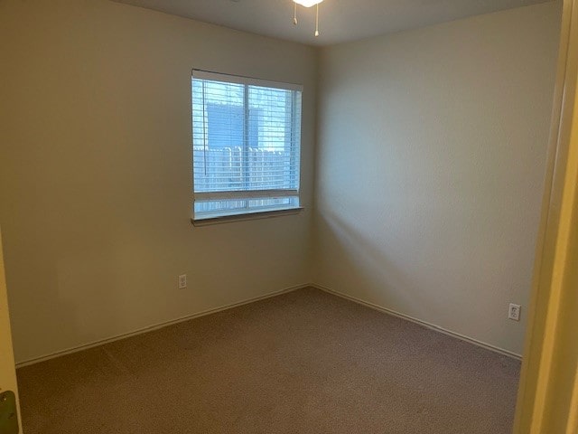 empty room with carpet floors