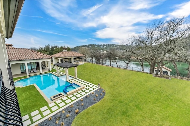 14132 Flat Top Ranch Rd, Austin, TX 78732 - view of pool with a water view, a pool with connected hot tub, a fenced backyard, and a patio area