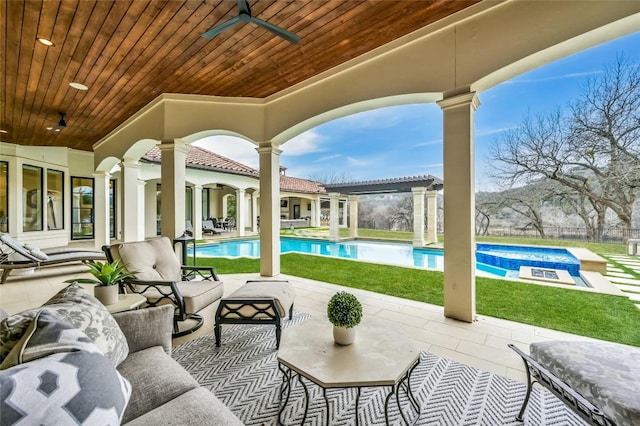 14132 Flat Top Ranch Rd, Austin, TX 78732 - view of patio / terrace with ceiling fan, an outdoor hangout area, and a pool with connected hot tub