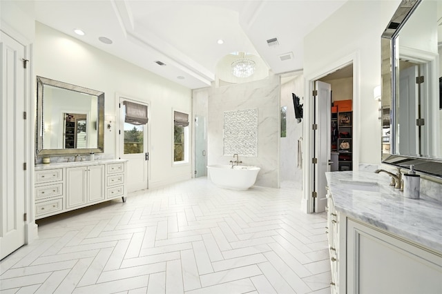 bathroom featuring vanity, parquet flooring, and independent shower and bath