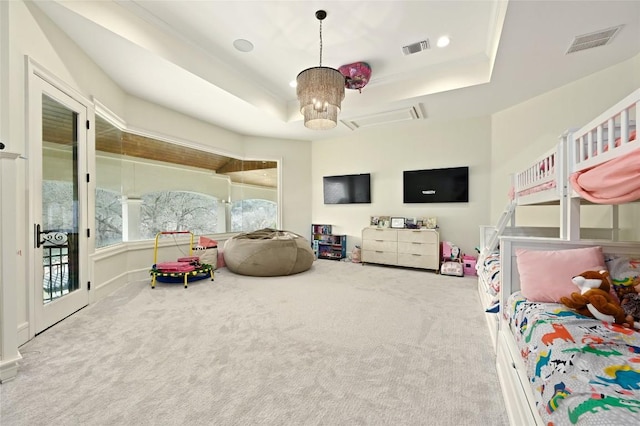 14132 Flat Top Ranch Rd, Austin, TX 78732 - bedroom with a tray ceiling, carpet, and access to exterior