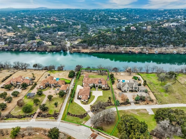 birds eye view of property featuring a water view