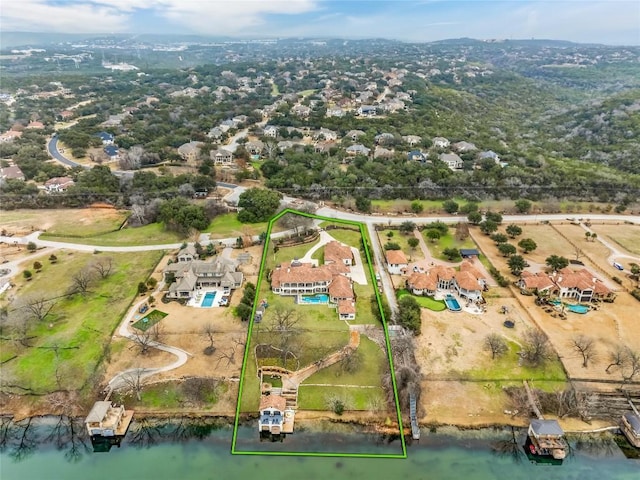 drone / aerial view featuring a water view