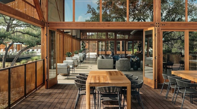 sunroom / solarium with a healthy amount of sunlight