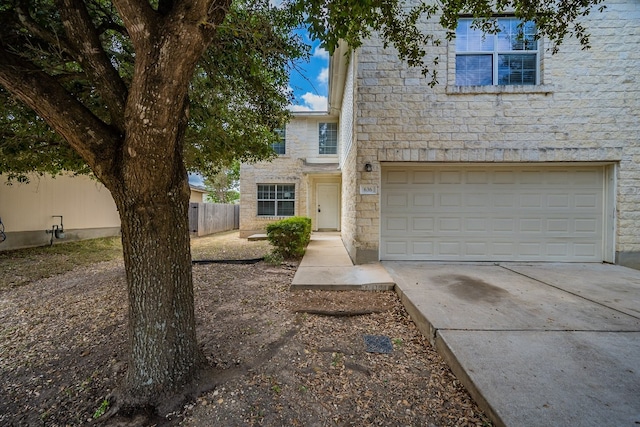 view of front of home with a garage