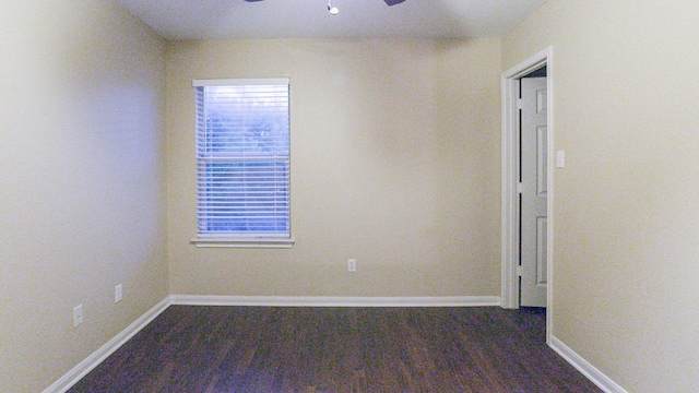 empty room featuring hardwood / wood-style flooring and ceiling fan