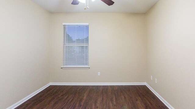 empty room featuring hardwood / wood-style floors and ceiling fan