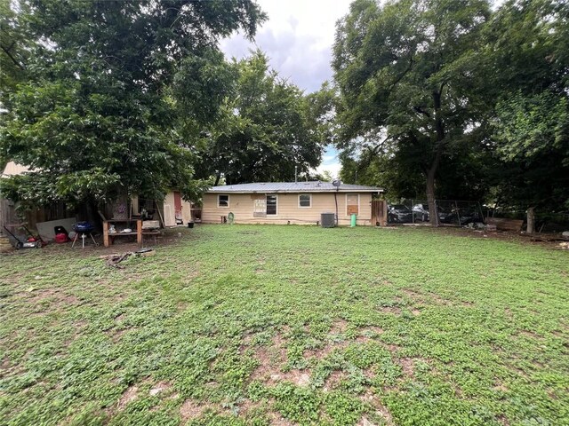 view of yard with central AC