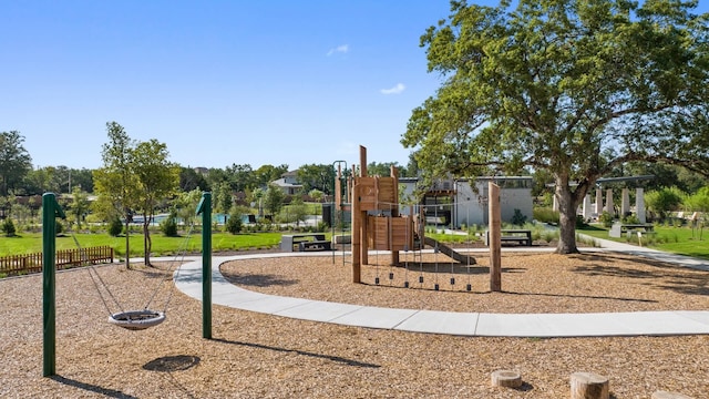 community jungle gym featuring fence