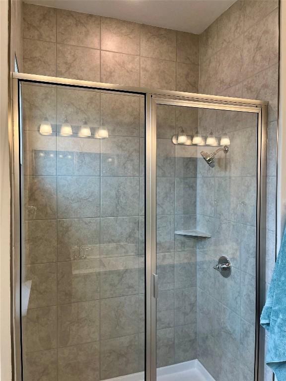 bathroom with a stall shower