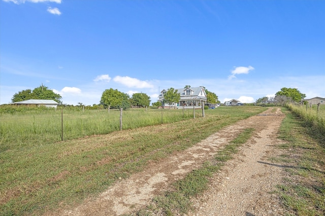 view of street featuring a rural view