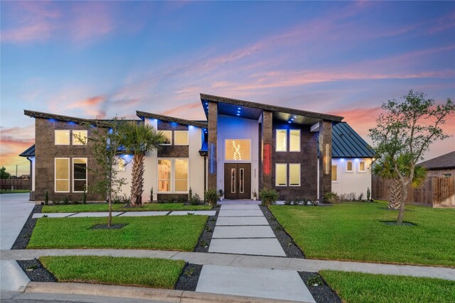 contemporary house with a yard