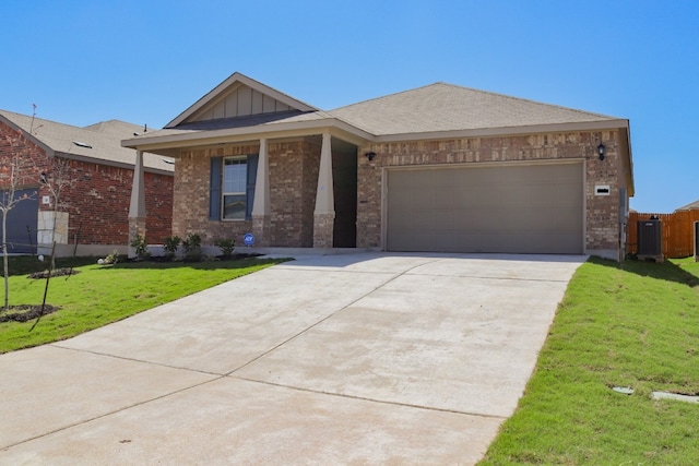 ranch-style home featuring a garage, a front lawn, and cooling unit