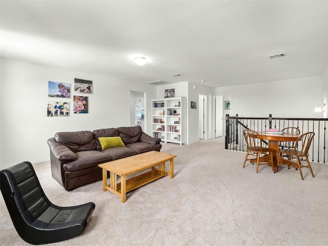 living room featuring light colored carpet