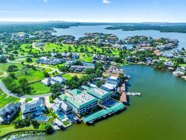 aerial view featuring a residential view and a water view