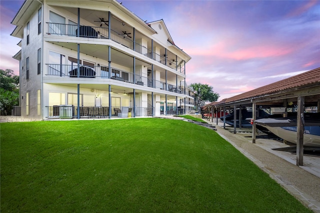 view of outdoor building at dusk