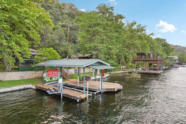 dock area featuring a water view