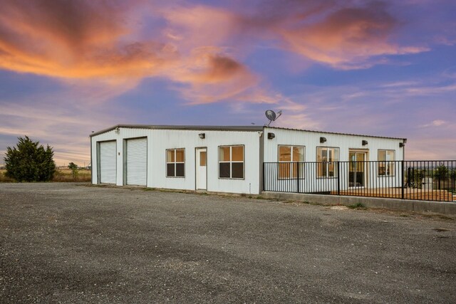 14409 Bois D Arc Ln, Manor, TX 78653 - exterior space featuring a detached garage and fence