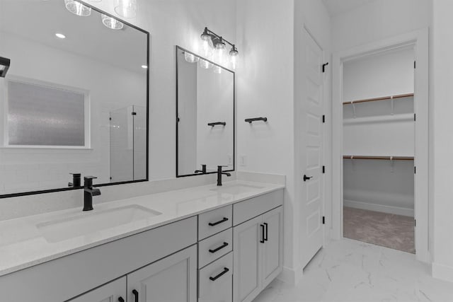 bathroom with vanity and walk in shower