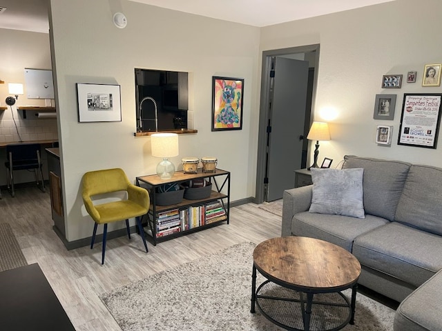 living room featuring light wood-type flooring