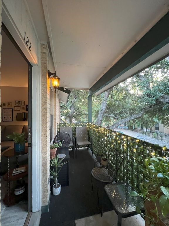 view of patio / terrace featuring a balcony