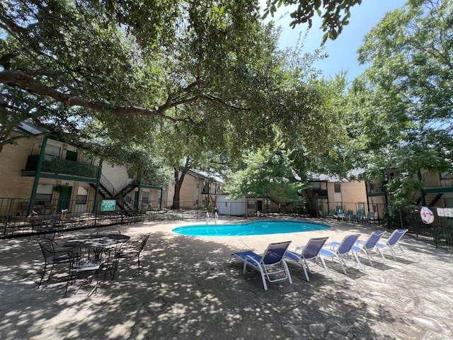 view of pool with a patio