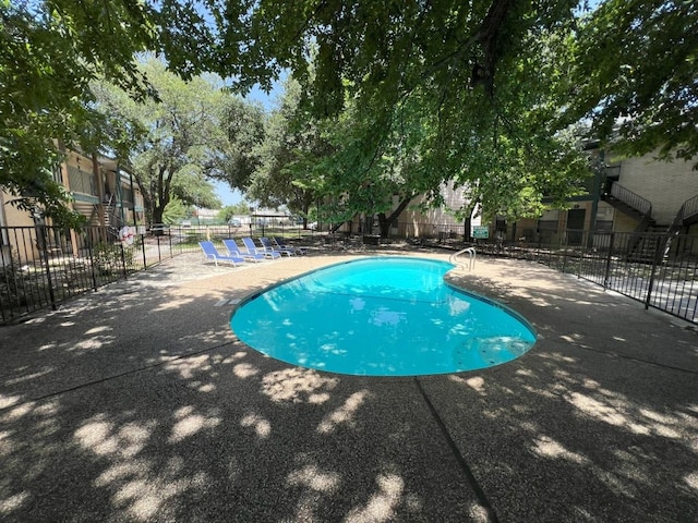 view of pool with a patio area