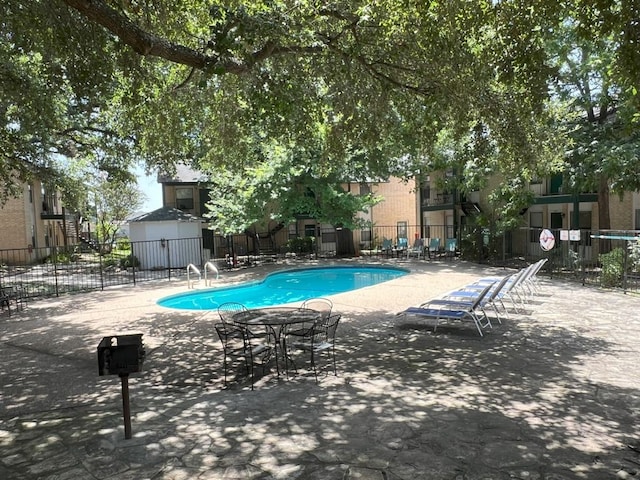 view of pool with a patio area